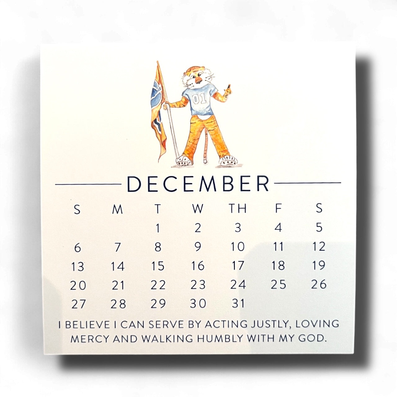 2026 Auburn Be the Creed Calendar on gold easel